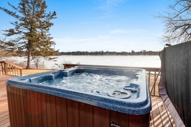 deck featuring a hot tub