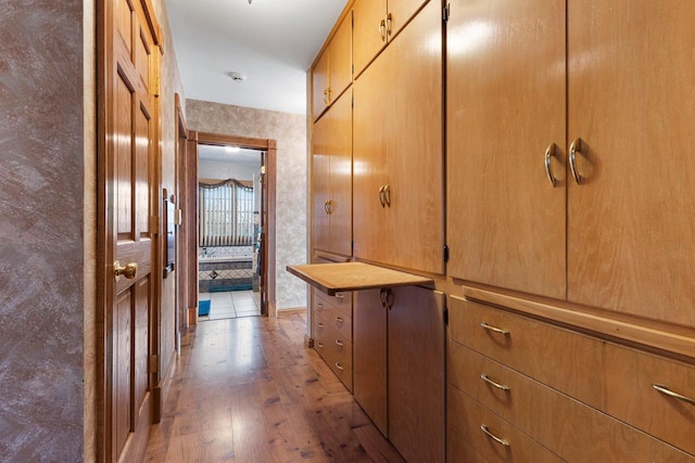 hall featuring wood finished floors