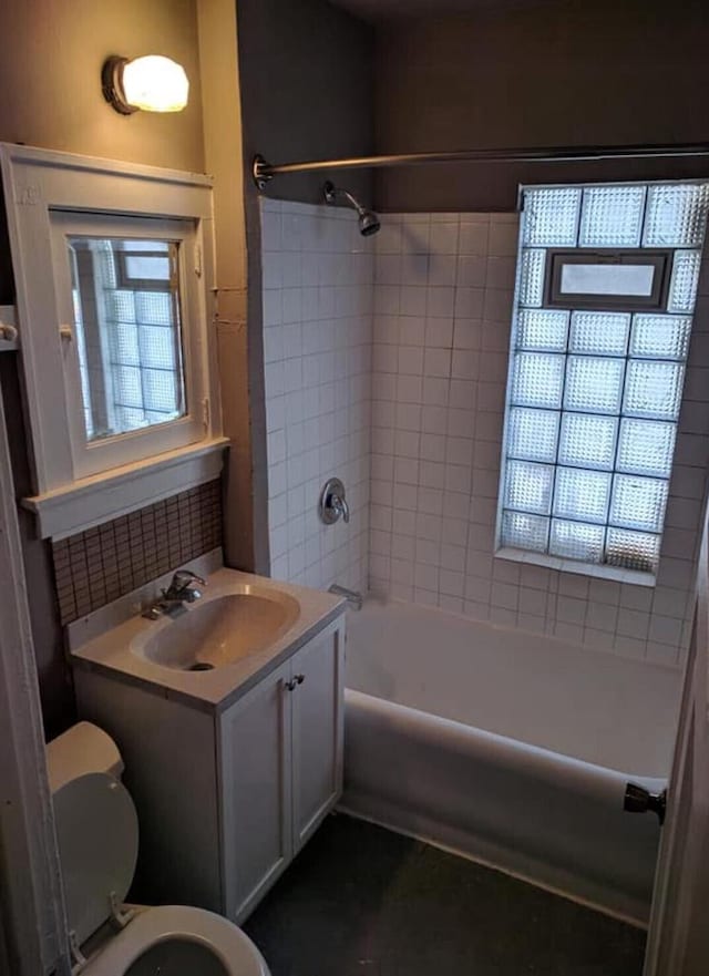 full bathroom with vanity, toilet, and shower / bath combination