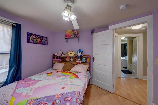 bedroom with light wood-style floors