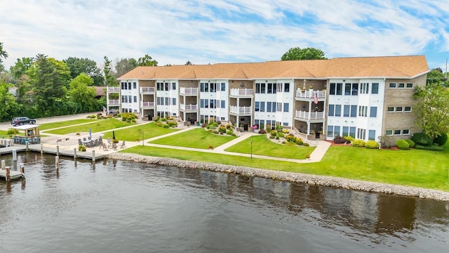 exterior space with a water view