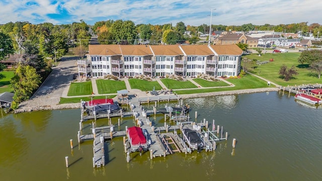 birds eye view of property featuring a water view