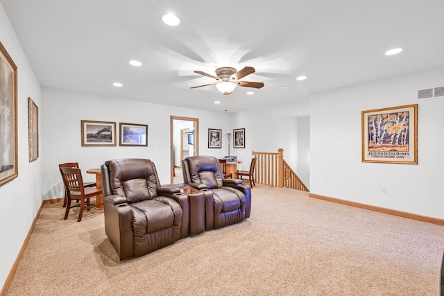 cinema room featuring a ceiling fan, baseboards, visible vents, recessed lighting, and light colored carpet