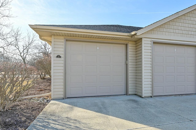 garage featuring driveway