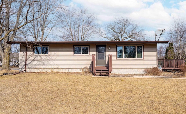 single story home featuring a front yard