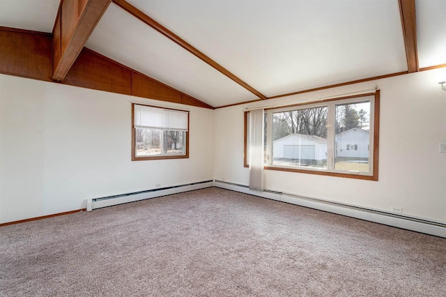 empty room featuring vaulted ceiling with beams and carpet floors