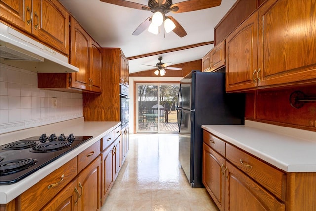 kitchen with a ceiling fan, black appliances, under cabinet range hood, brown cabinets, and backsplash