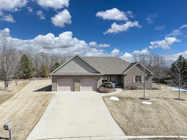 view of front of house featuring brick siding, concrete driveway, a garage, and a shingled roof