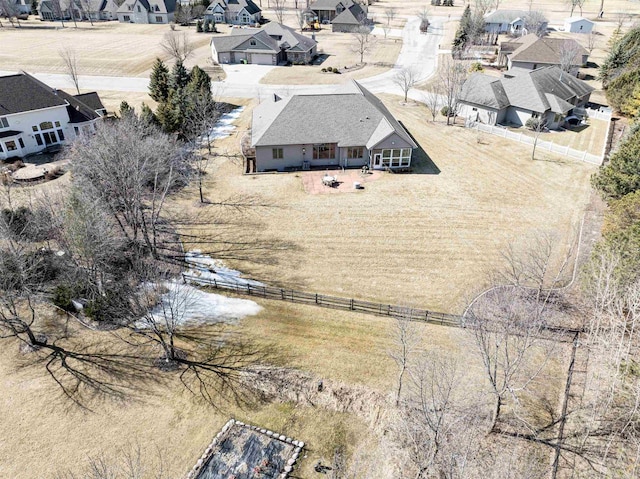 birds eye view of property with a residential view