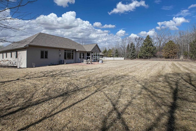 view of yard with a patio and fence