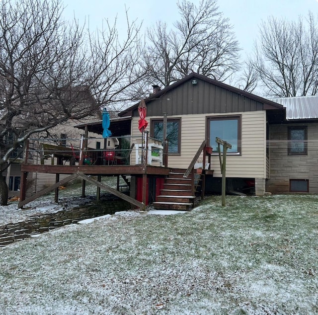 view of front facade with stairway and a deck