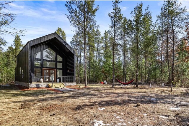 S10460 Black Creek Rd, Fairchild, WI 54741 - rear view of house with french doors