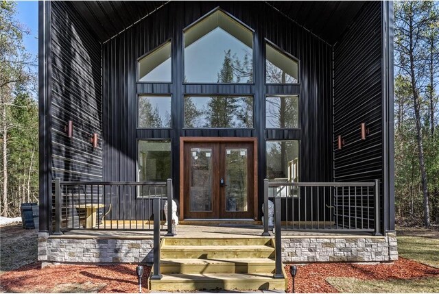 S10460 Black Creek Rd, Fairchild, WI 54741 - property entrance with stone siding and french doors