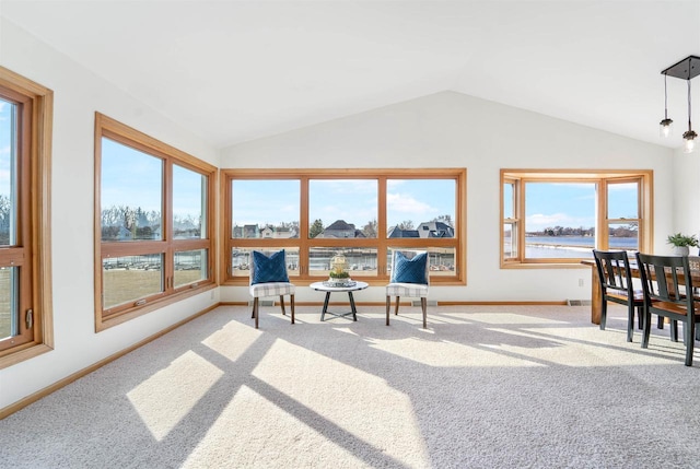 sunroom with visible vents and lofted ceiling