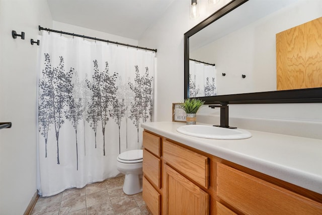 bathroom featuring vanity, tile patterned floors, toilet, and a shower with shower curtain