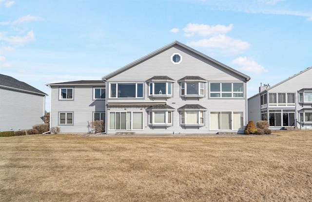 view of front of property with a front lawn