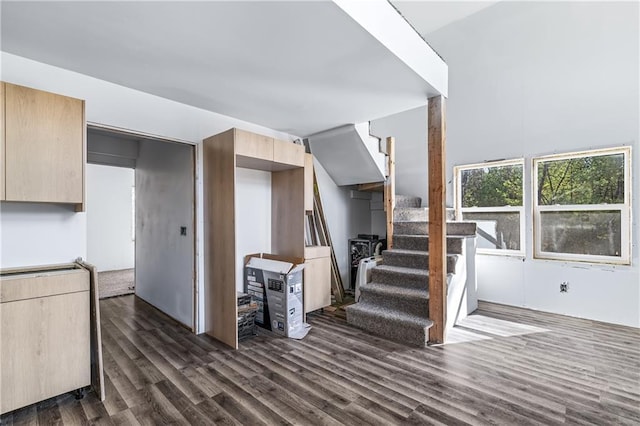 interior space with stairway and dark wood-style floors