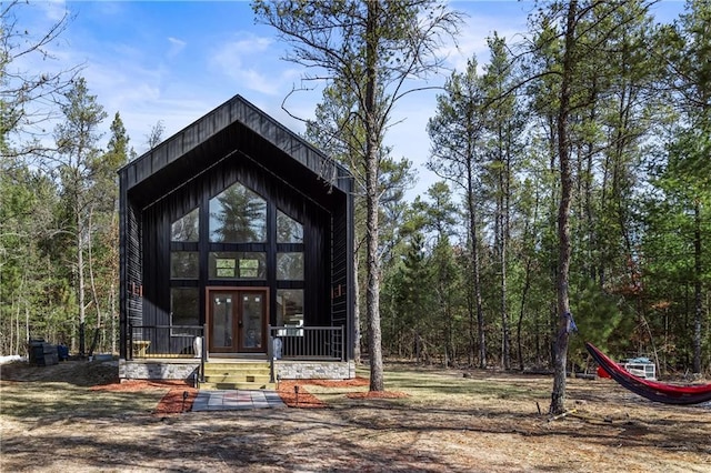 view of outbuilding featuring french doors