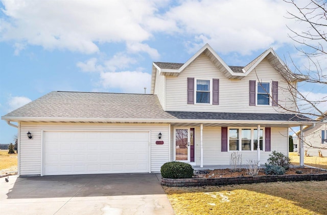 traditional-style home featuring a front yard, concrete driveway, an attached garage, and a shingled roof