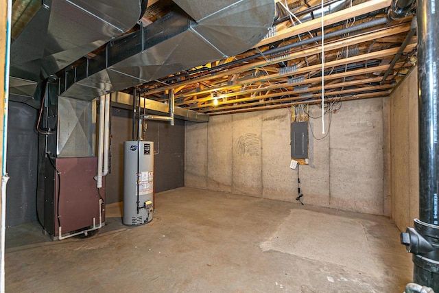 unfinished below grade area with gas water heater, heating unit, and electric panel