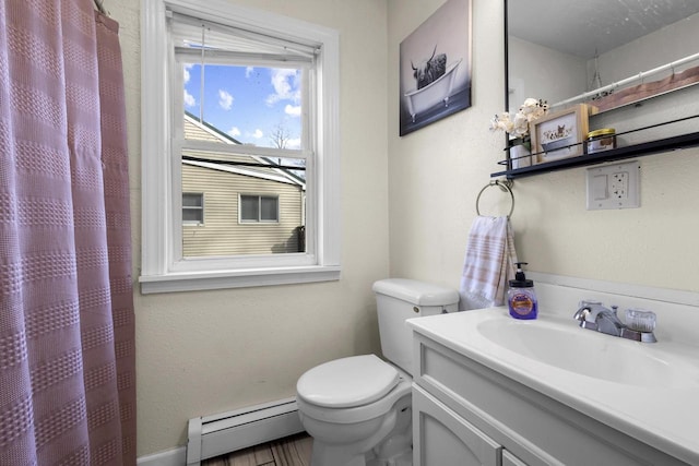 bathroom with baseboard heating, curtained shower, toilet, and vanity