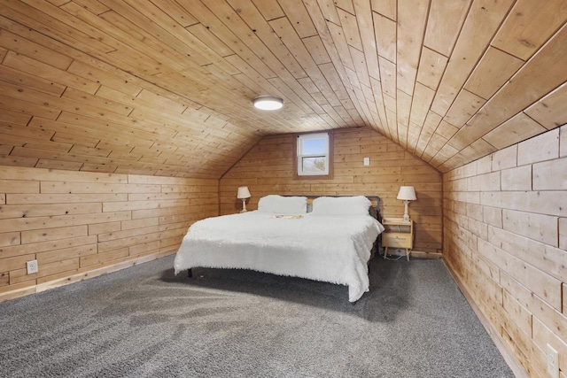 unfurnished bedroom featuring carpet, wood ceiling, wood walls, and vaulted ceiling