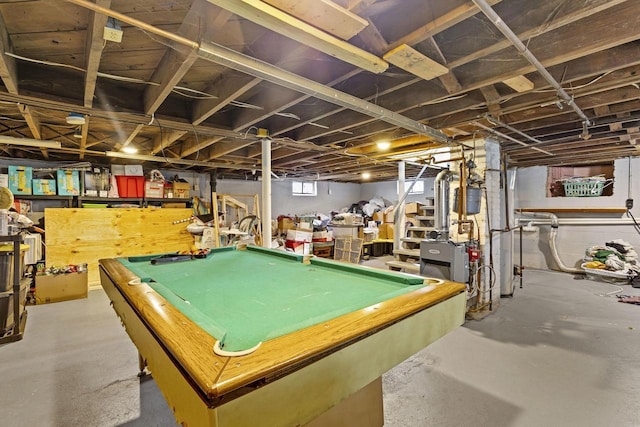 playroom featuring concrete flooring and pool table