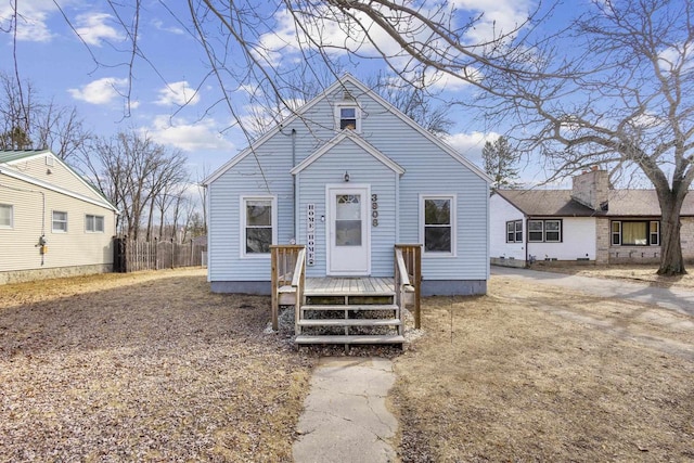 view of front of house with a wooden deck