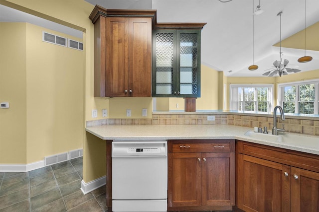 kitchen with a ceiling fan, visible vents, white dishwasher, and a sink