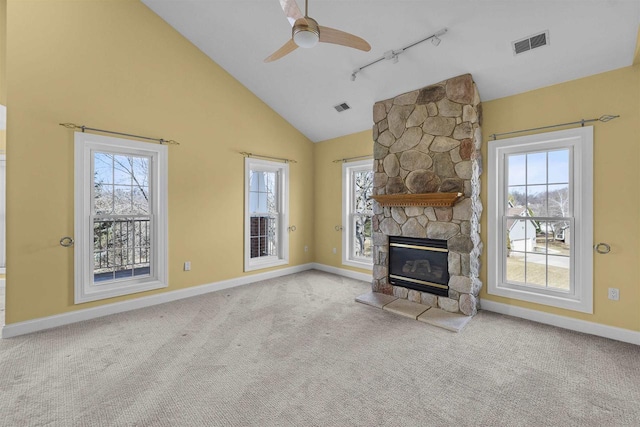 unfurnished living room with visible vents, carpet flooring, and ceiling fan