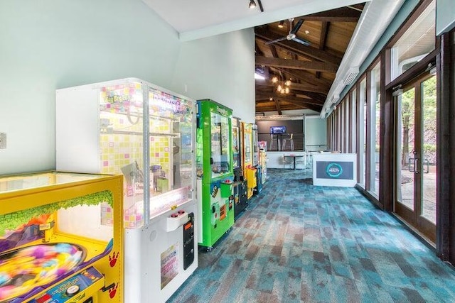 game room with lofted ceiling