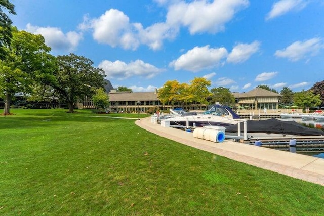 view of yard featuring a boat dock