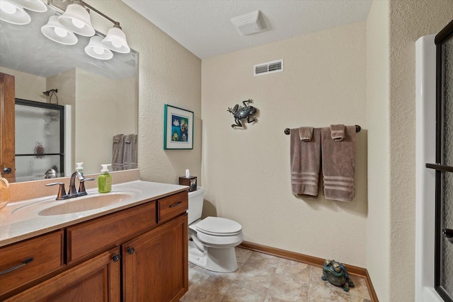 full bath featuring visible vents, toilet, a shower stall, baseboards, and vanity