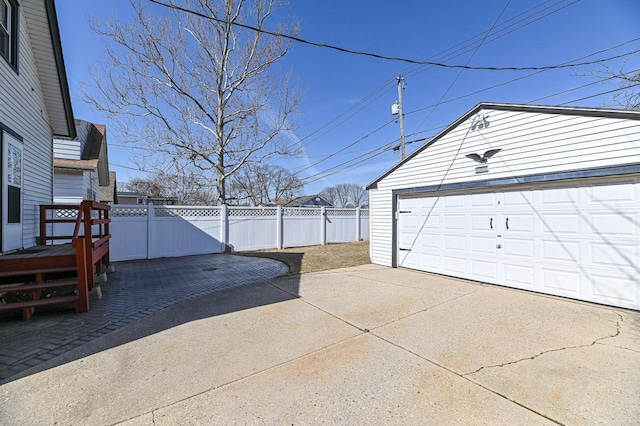 detached garage with fence