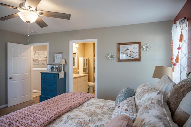 bedroom with carpet, a ceiling fan, and connected bathroom