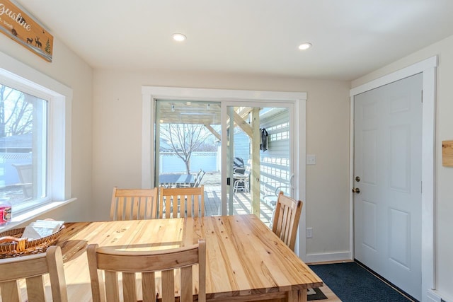 dining area with recessed lighting, baseboards, and plenty of natural light