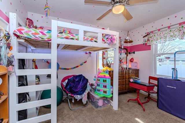 carpeted bedroom with a ceiling fan