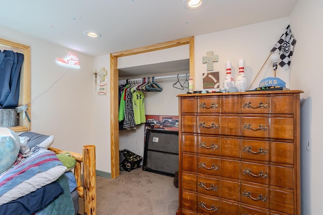 bedroom featuring light carpet, recessed lighting, and baseboards