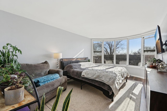 bedroom featuring wood finished floors