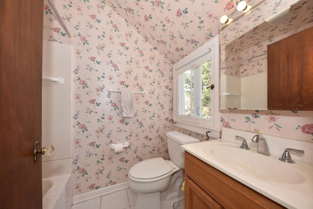 full bath featuring tile patterned flooring, wallpapered walls, baseboards, toilet, and vanity