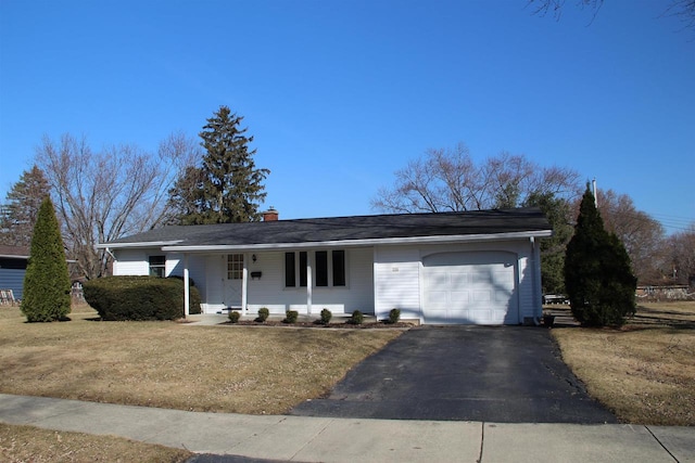 ranch-style house with aphalt driveway, a garage, and a chimney