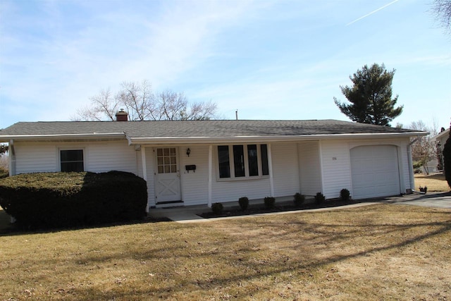 ranch-style home with a garage, a chimney, concrete driveway, and a front lawn