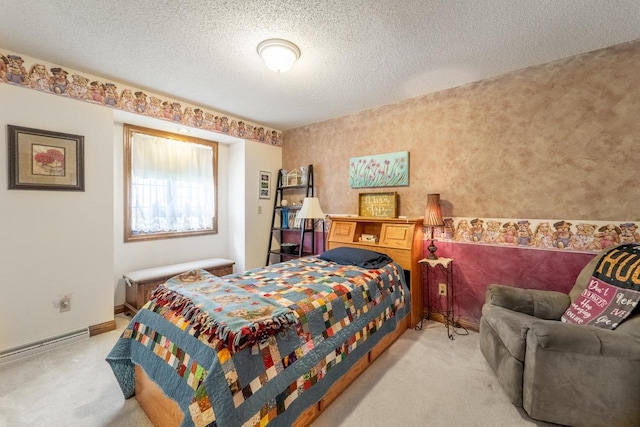 bedroom with carpet, baseboards, a baseboard radiator, wallpapered walls, and a textured ceiling