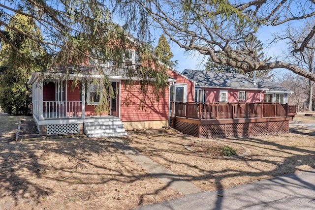 back of house with covered porch