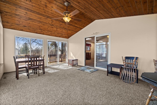 sunroom with wooden ceiling, a ceiling fan, and vaulted ceiling