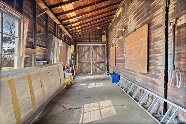 miscellaneous room featuring lofted ceiling and wood ceiling