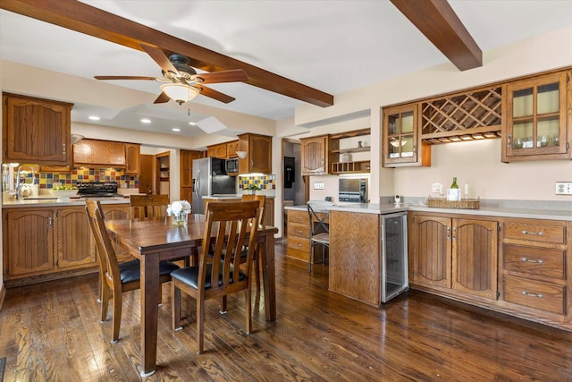 dining room with beverage cooler, dark wood-style floors, a ceiling fan, and beam ceiling