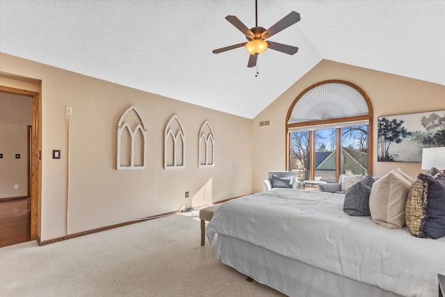 bedroom with visible vents, a ceiling fan, a textured ceiling, carpet flooring, and lofted ceiling