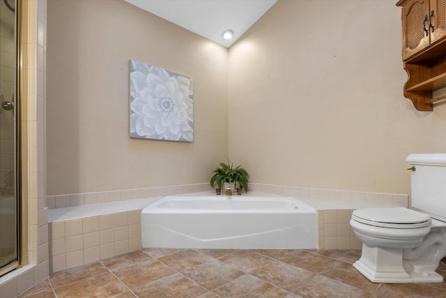 bathroom with a bath, tiled shower, tile patterned floors, and toilet