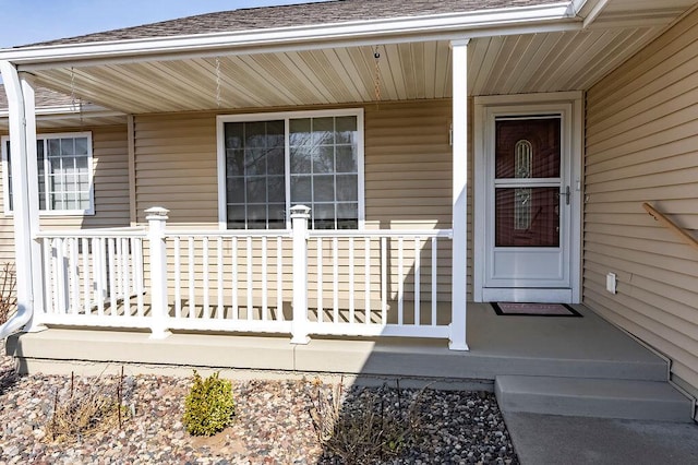 property entrance featuring covered porch